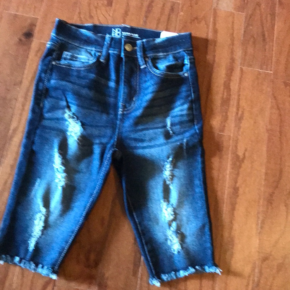 Denim distressed shorts 😀.      Size 3